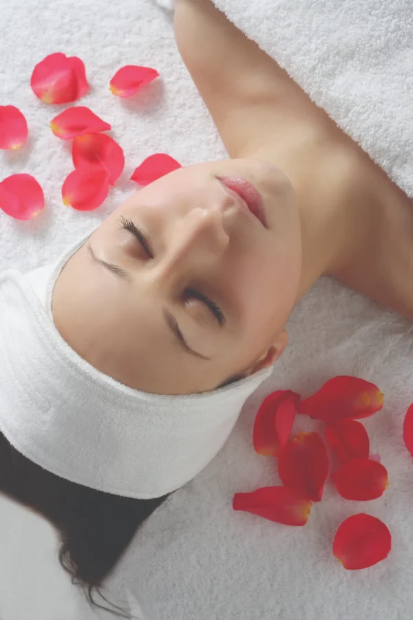 Woman receiving facial reflexology